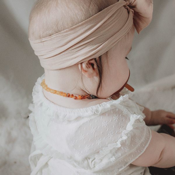 Ecopiggy Shop - Baltic Amber Necklace on Baby